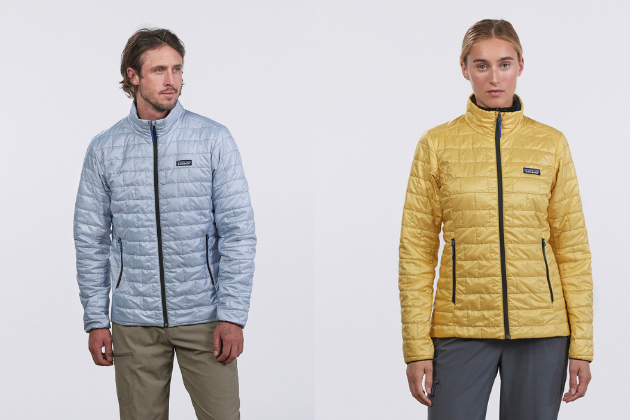 Homme en veste bleue et femme en veste jaune, tous deux debout face à l'appareil